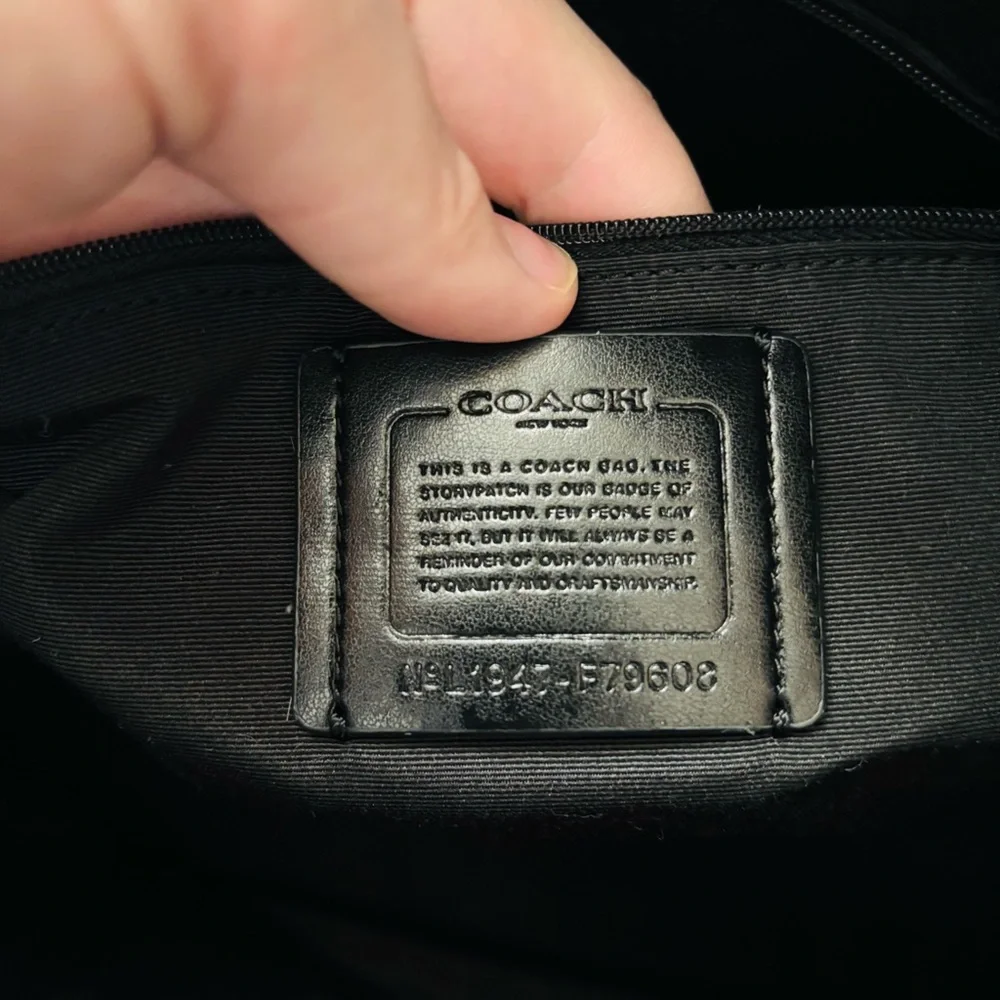 Coach sleek black